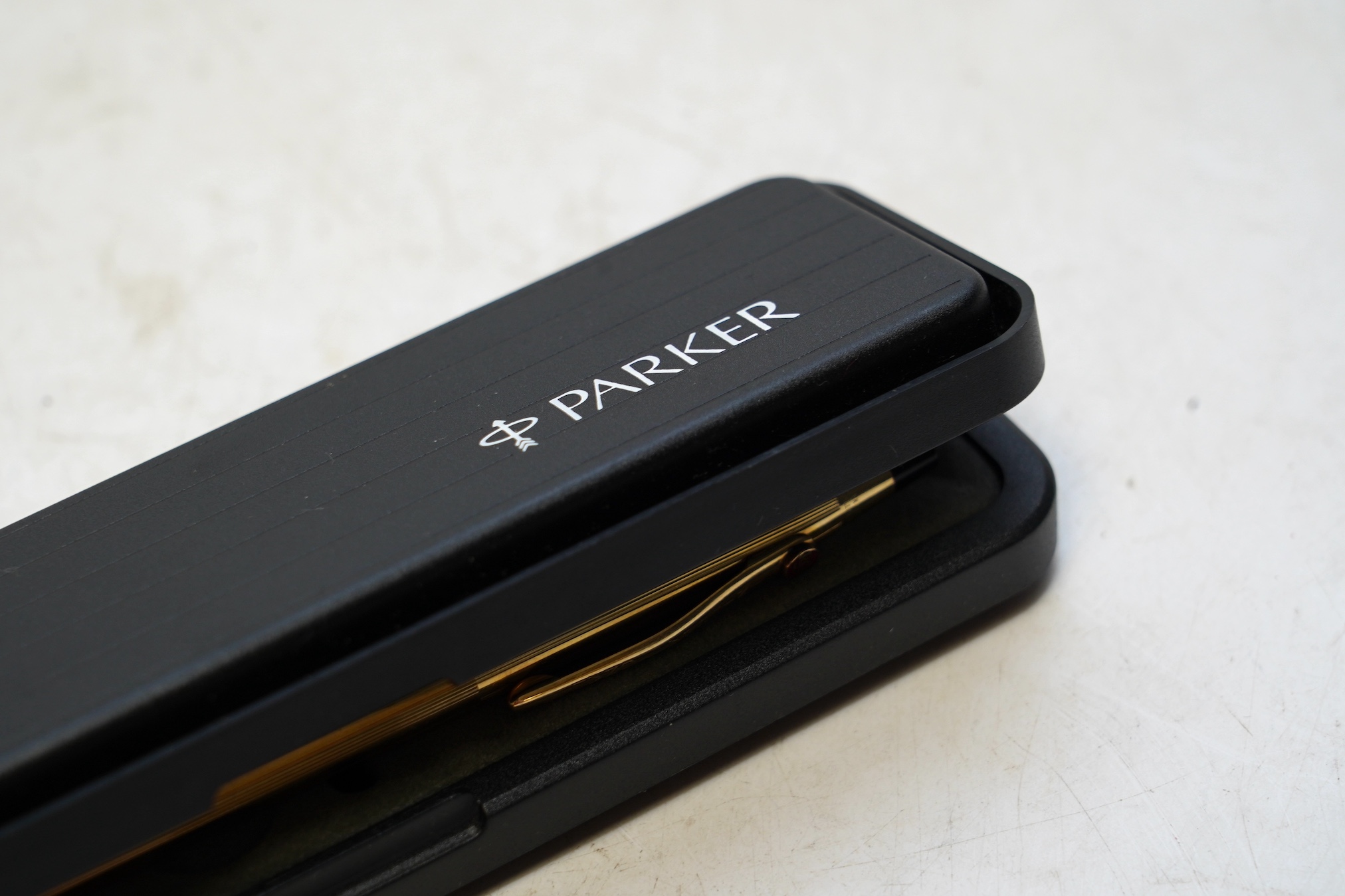 A Parker ballpoint pen, a rolled gold ballpoint pen and propelling pencil (3). Condition - good but not tested as working